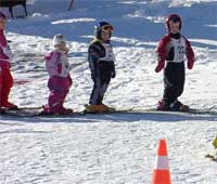 Skischule - Kinder auf Ski